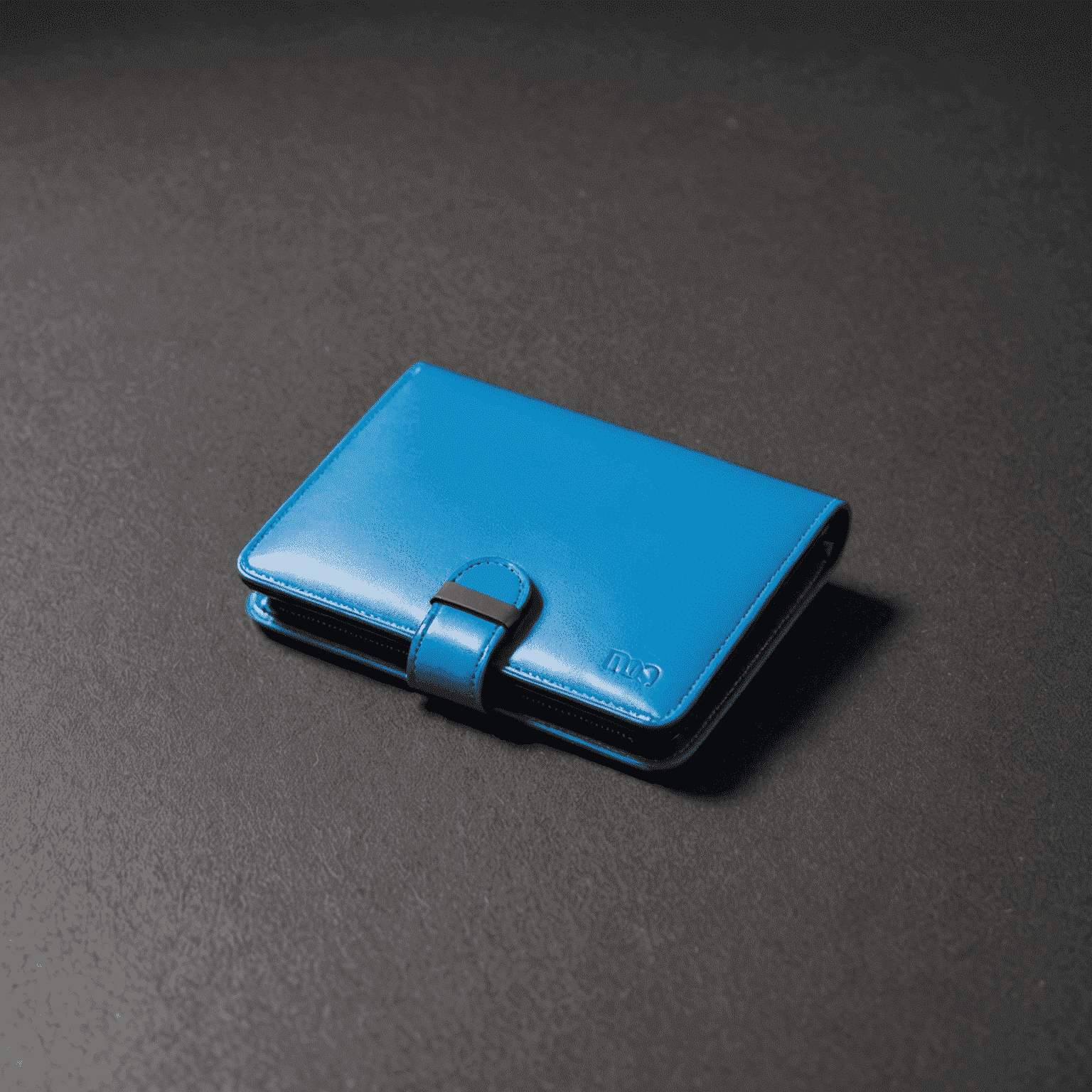 A sleek, finished Ton_Wallet displayed on a reflective surface with neon blue accents, showcasing its premium quality and sustainable origins.